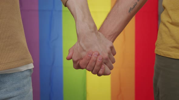 Close Up of Gay Couple Holding Hands