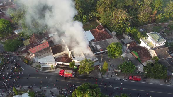 Aerial view of house fires in densely populated settlements in Indonesia