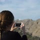 Woman taking pictures in Cap Formentor in Mallorca - VideoHive Item for Sale