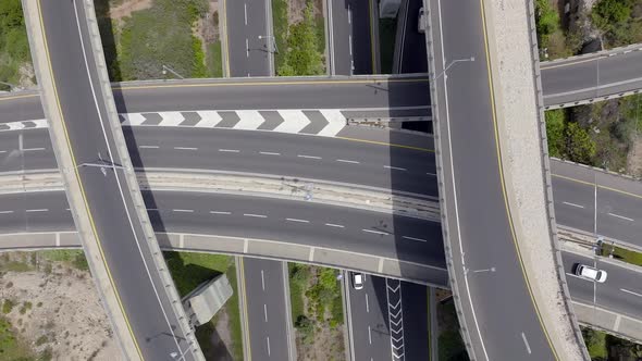 Timelapse of a Massive multi level highway interchange with traffic on all routes, Aerial view.