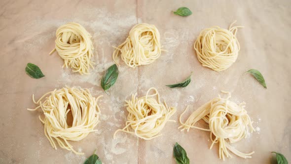 Home Made Pasta on the Table with Flour