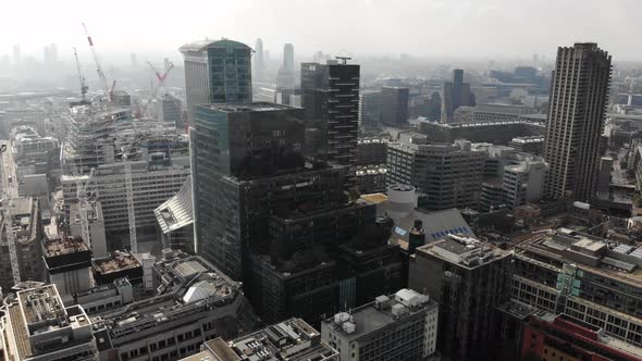 Aerial view of Citypoint and Barbican estate on a sunny hazy day in London