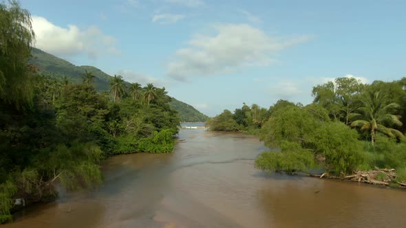 Aerial View Of River Flowing In Forest, Yelapa, Jalisco, Mexico - drone shot