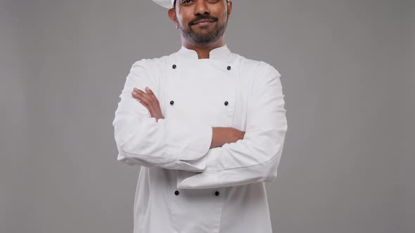 Happy Male Indian Chef in Toque 