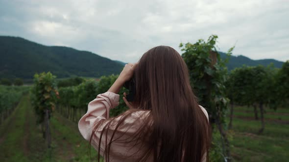 Girl Capturing Vineyards in Wachau Valley Austria