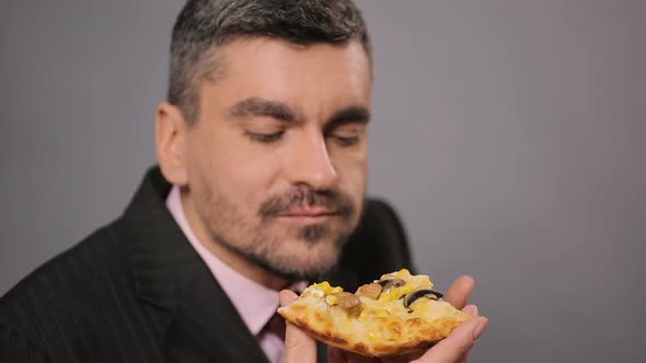 Hungry Office Worker Eating Appetizing Cheese Pizza, Man Enjoying Fastfood