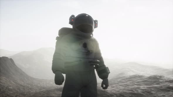 Astronaut on Another Planet with Dust and Fog alt