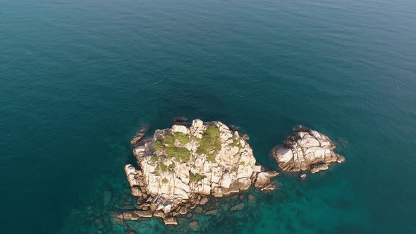 Small Boat and Small island in Sea