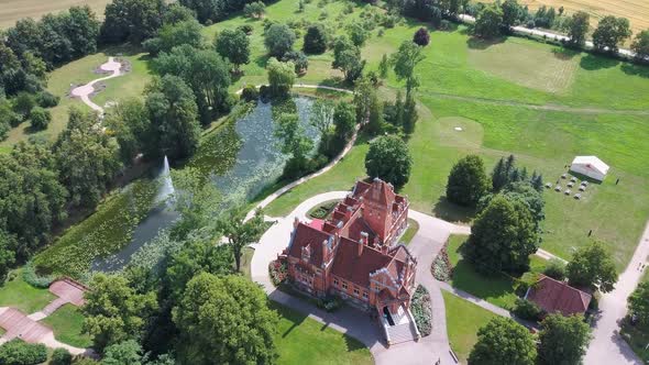 Jaunmoku Brick Medieval Castle Near Tukums, Latvia  Aerial Dron 4k Shot Jaunmokas Manor Park.