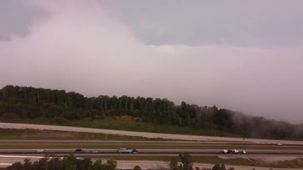 Vehicles Passing Through Interstate-75 Highway - Rarity Mountain Road In Tennessee - aerial tracking