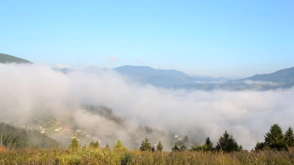 Morning Fog Dissipates in the Mountains Carpathians
