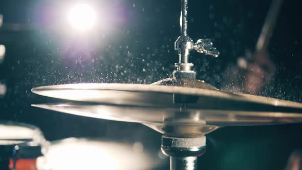 Man Plays Drums Hitting Cymbal