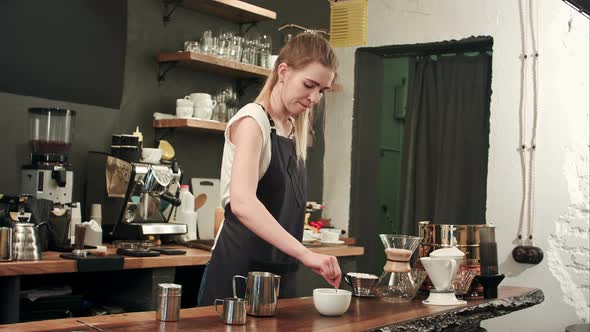 Pretty Barista Making Coffee at Cafe, Pouring Milk To a Cup