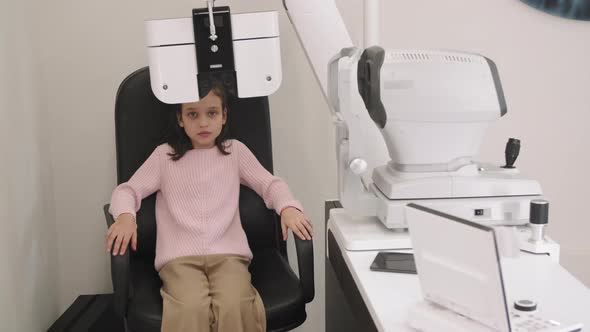 Little Girl Doing Eye Vision Test