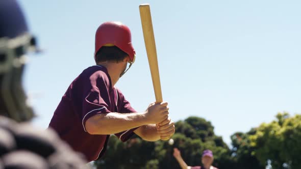 Batter hitting ball during practice session