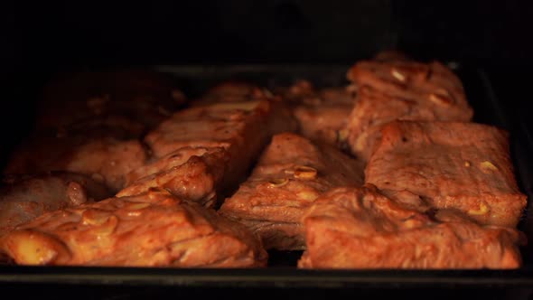 Close Up of Baked Pork Ribs on Tray in Oven