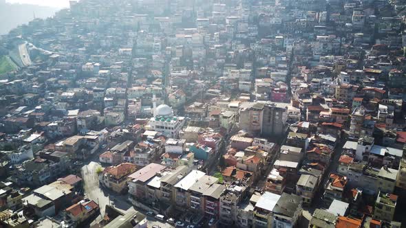 Drone view on poverty slum district and muslim mosque