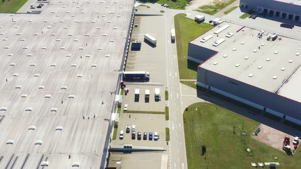 Aerial view of warehouse storages or industrial factory or logistics center from above. Aerial view