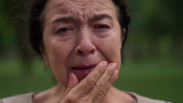 Headshot Portrait Crying Desperate Frustrated Caucasian Senior Woman Closing Face with Hands