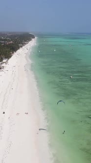 Vertical Video Boats in the Ocean Near the Coast of Zanzibar Tanzania