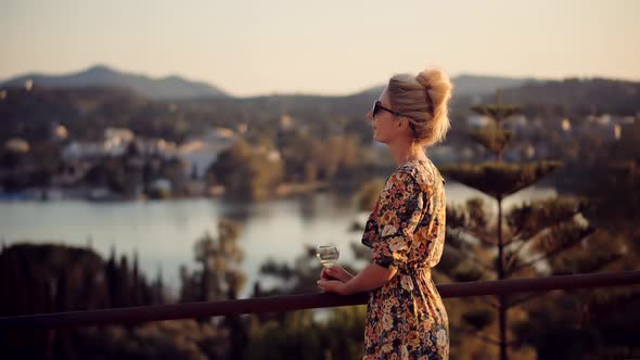 Woman Celebrating On Vacation On Kerkyra.Idyllic Leisure Epic Sunset Oh Holidays.