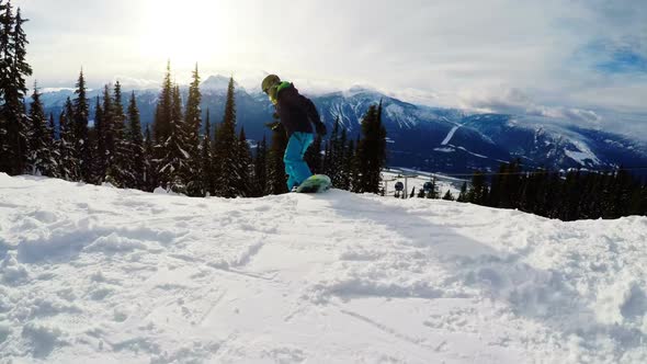 Snowboarder snowboarding on snow mountain