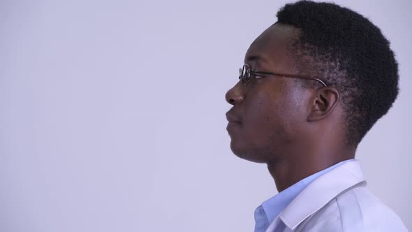 Closeup Profile View of Young Handsome African Man Doctor with Eyeglasses