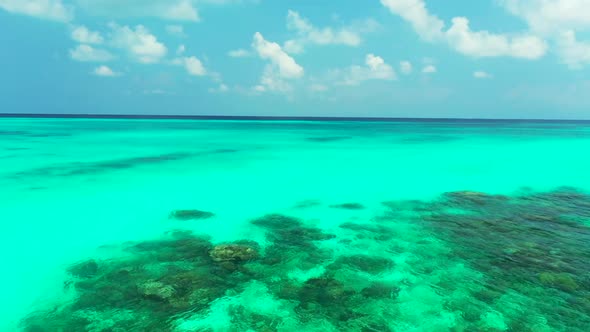 Aerial flying over abstract of tropical shore beach trip by aqua blue sea and bright sand background