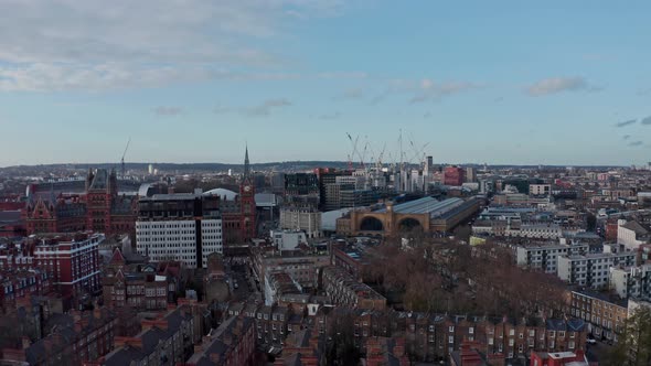 Slow dolly forward drone shot towards London kings cross st Pancras train station