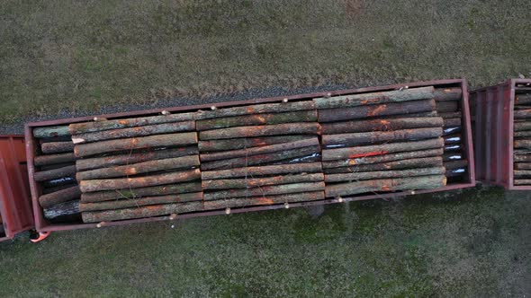 railway wagons carrying logs top view