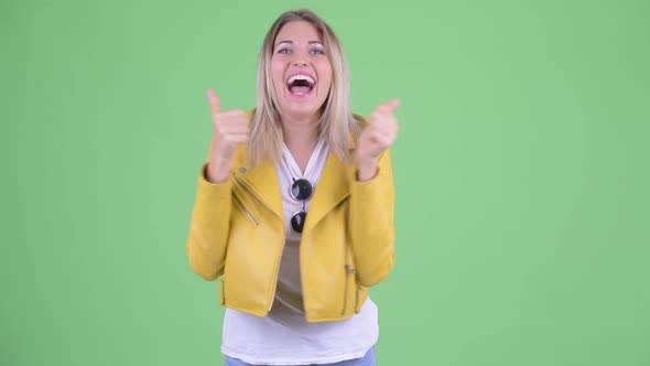 Happy Young Rebellious Blonde Woman Talking and Looking Excited