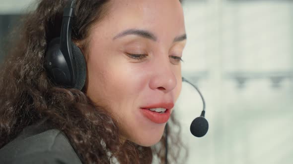 Latino beautiful business woman call center smile while work in office.