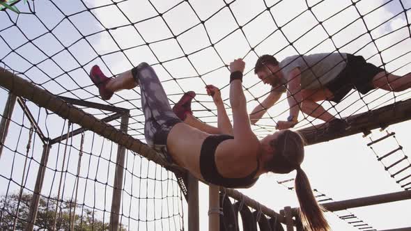 Young adults training at an outdoor gym bootcamp