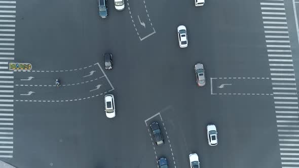 Aerial Drone Rotating Shot of Crossroad in the City Cars and Buses Driving By Avenue