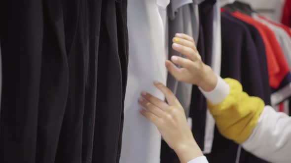 Stylish Lady Shopping in Clothing Store