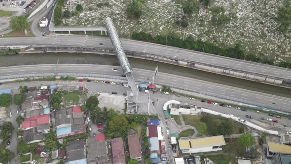 Aerial view of bridge, highway and village in Kampung Baru, Kuala Lumpur