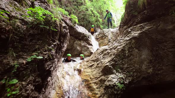 Aerial view of a group of people canyoning in Soca river, Slovenia