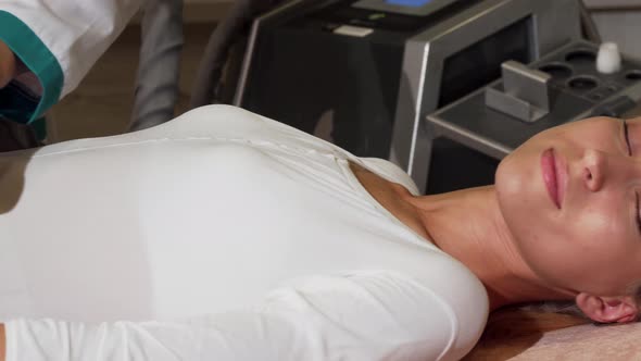 Attractive Woman Smiling While Receiving Anti-cellulite Massage