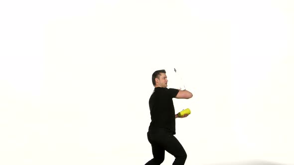 Man Bartender Does a Trick with a Shaker on White