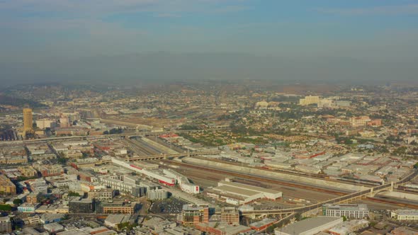 AERIAL: LA River in Los Angeles, California Industry in Beautiful Sunlight,blue Sky, 