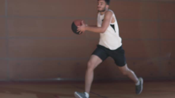 Slowmo of Player Shooting Basketball