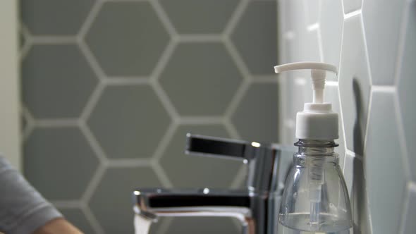 Close Up of Woman Washing Hands with Liquid Soap