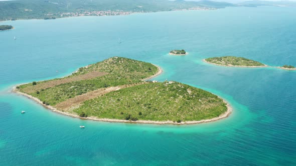 Famous Galesnjak Island and Sailing Ships on Calm Sea