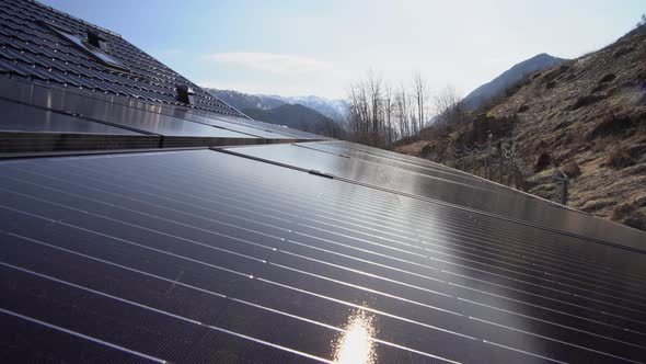 Solar roof installation on private home - Moving beautifylly close to roof with sun reflections in p