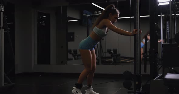 Woman Make Exercise on Gym Training Apparatus