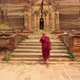 Asian Monk Walking In Front Of Burmese Ancient Buddhist Temple. Slow Motion Footage. Mandalay - VideoHive Item for Sale