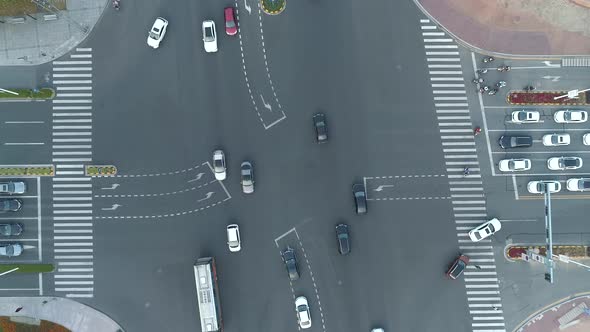 Accelerated Aerial Drone Shot of Crossroad in the City Cars and Buses Driving By Avenue