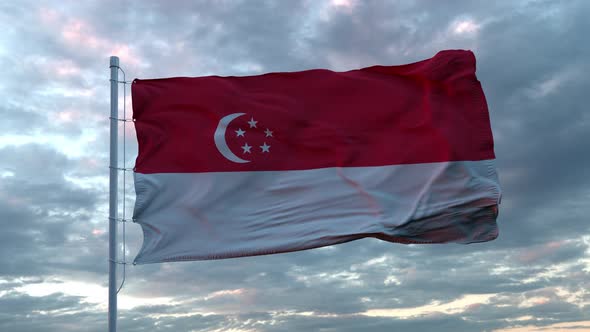 Realistic flag of Singapore waving in the wind against deep dramatic sky