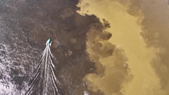 Famous Meeting of the Waters tourism landmark at Manaus Brazil.