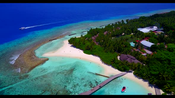Aerial above scenery of relaxing resort beach time by blue lagoon with white sand background of jour